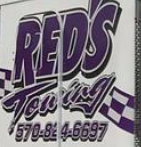 Red's Towing Inc logo